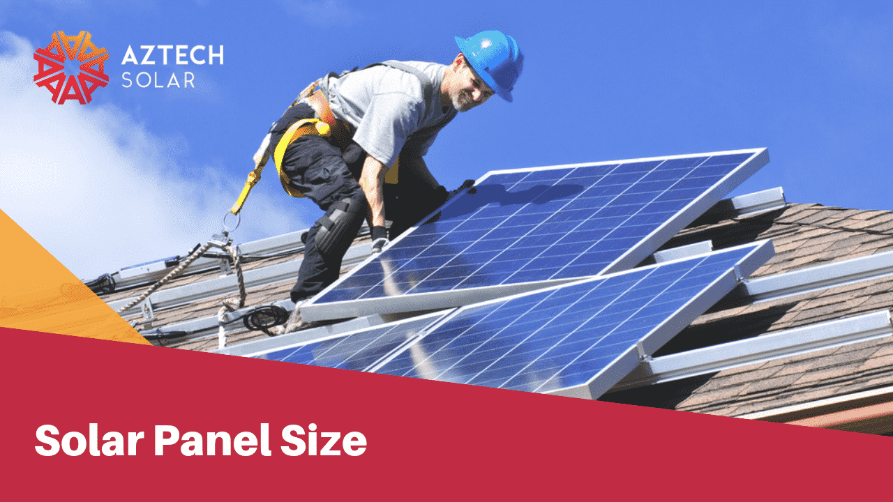 Installer fitting solar panels on rooftop