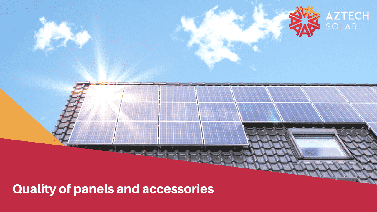 Rooftop solar panels under bright sun flare