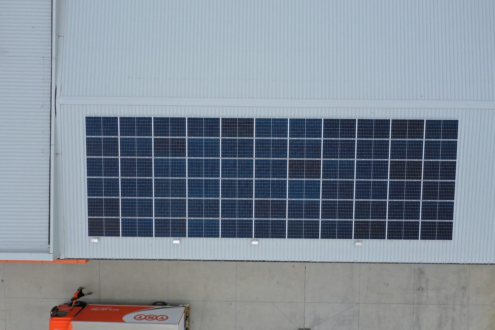Solar panels installed on industrial warehouse roof