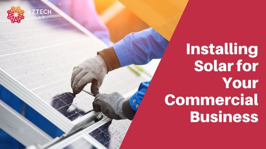 Technician installing solar panels for businesses.