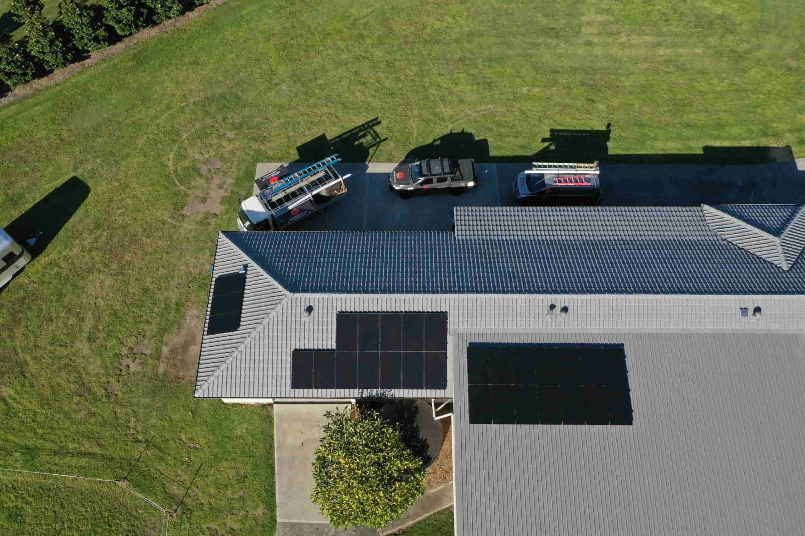 Aerial view of house with solar panels installed.
