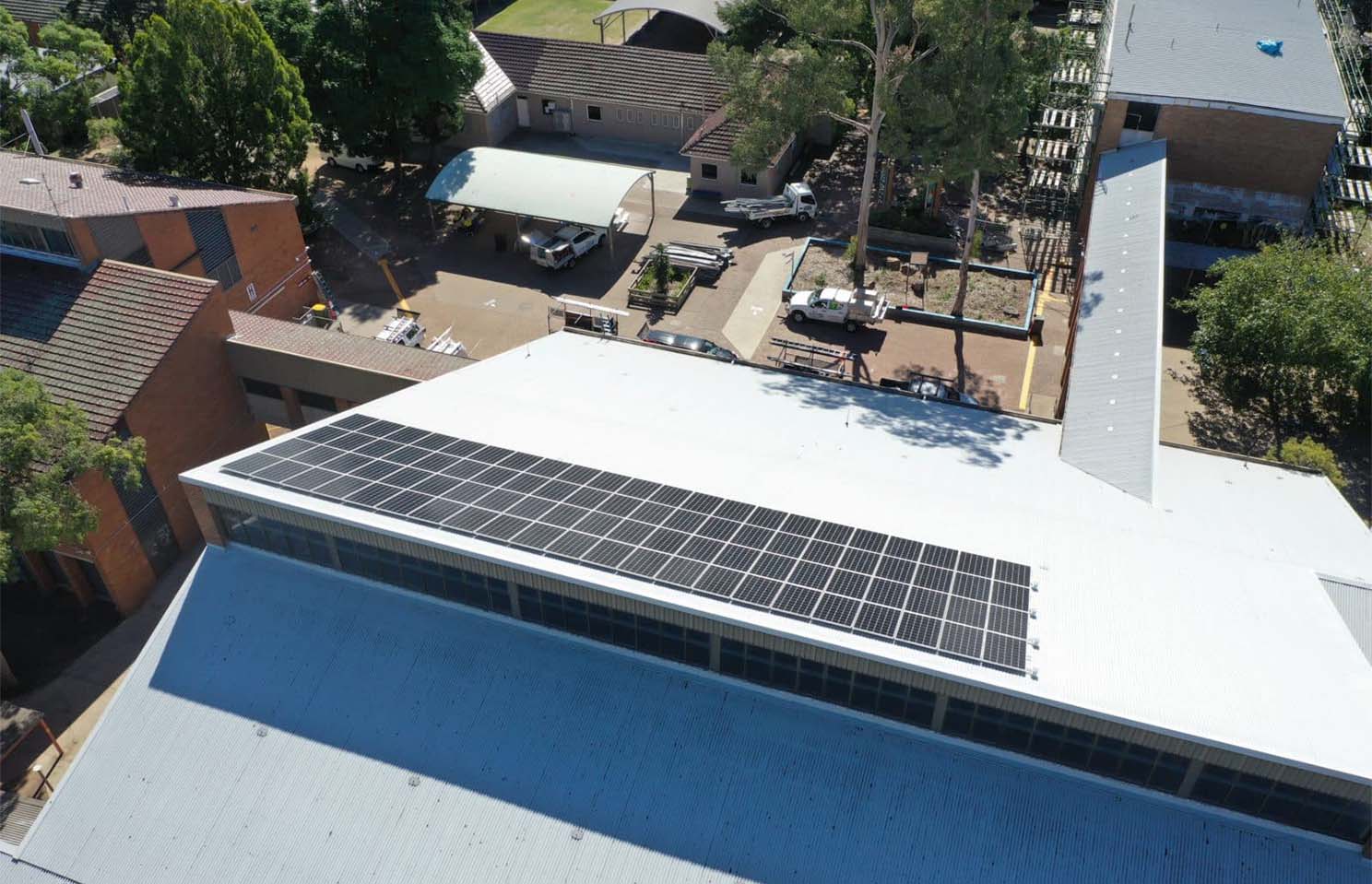 Aerial view of a building with solar panels