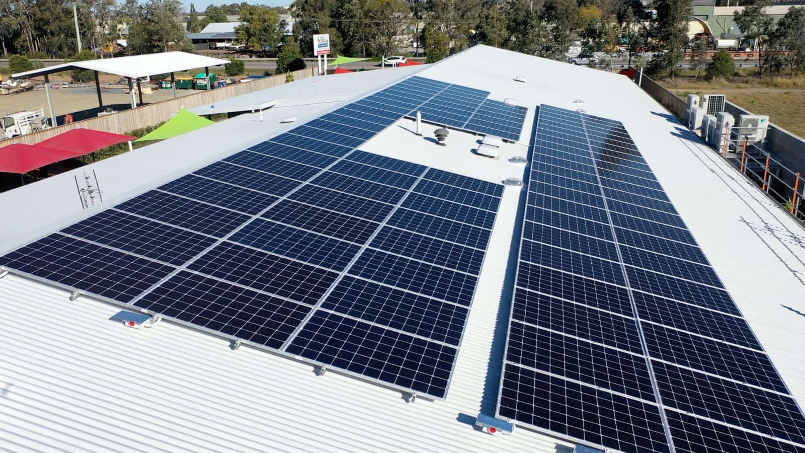 Solar panels on a commercial building rooftop