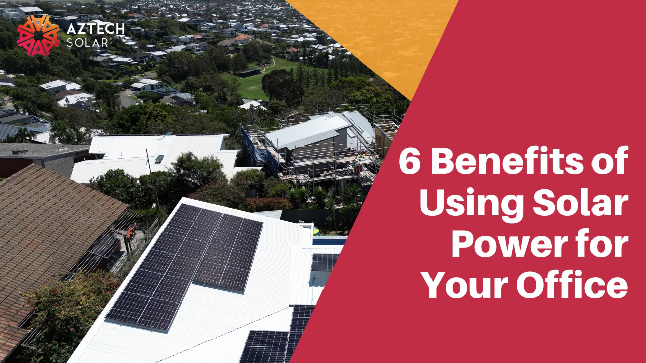 Office rooftop solar panels in suburban neighbourhood