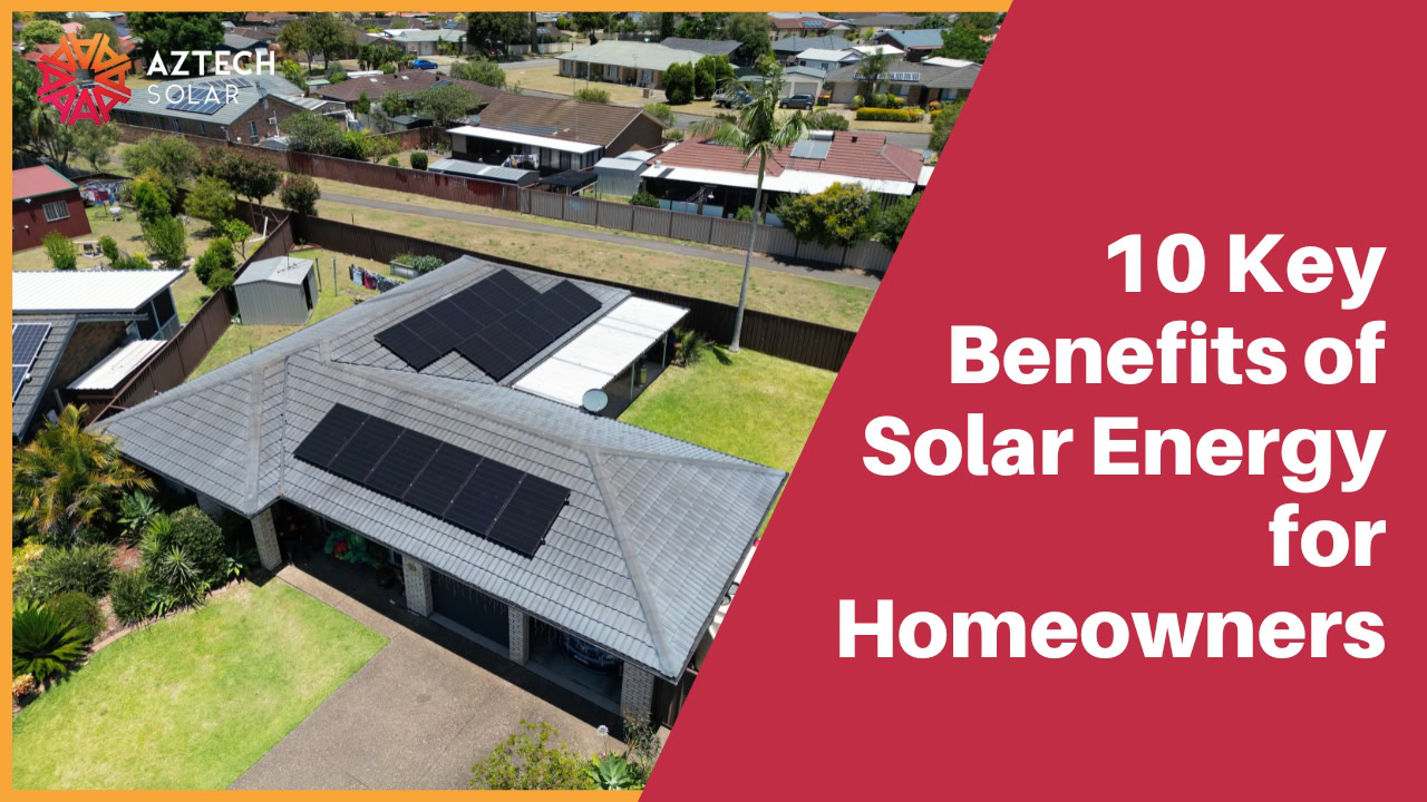Aerial view of suburban home with rooftop solar panels