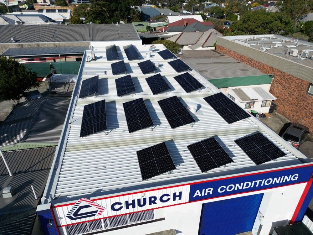 Roof with solar panels on commercial building.