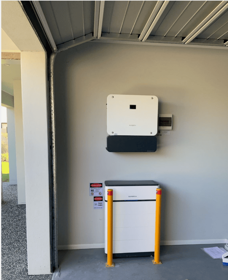 Solar energy system installation in garage.