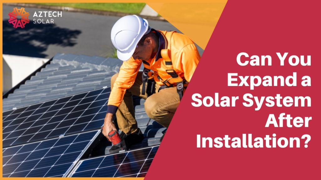 Electrician installing solar panels on a rooftop.